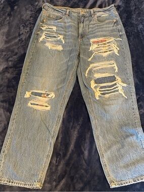 Distressed patched jeans